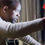 Will Smith Watching outside from small window